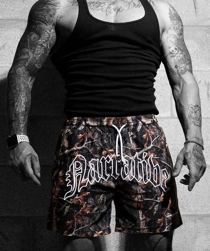 Narrative signature logo workout shorts in woodland camo for gym training performance