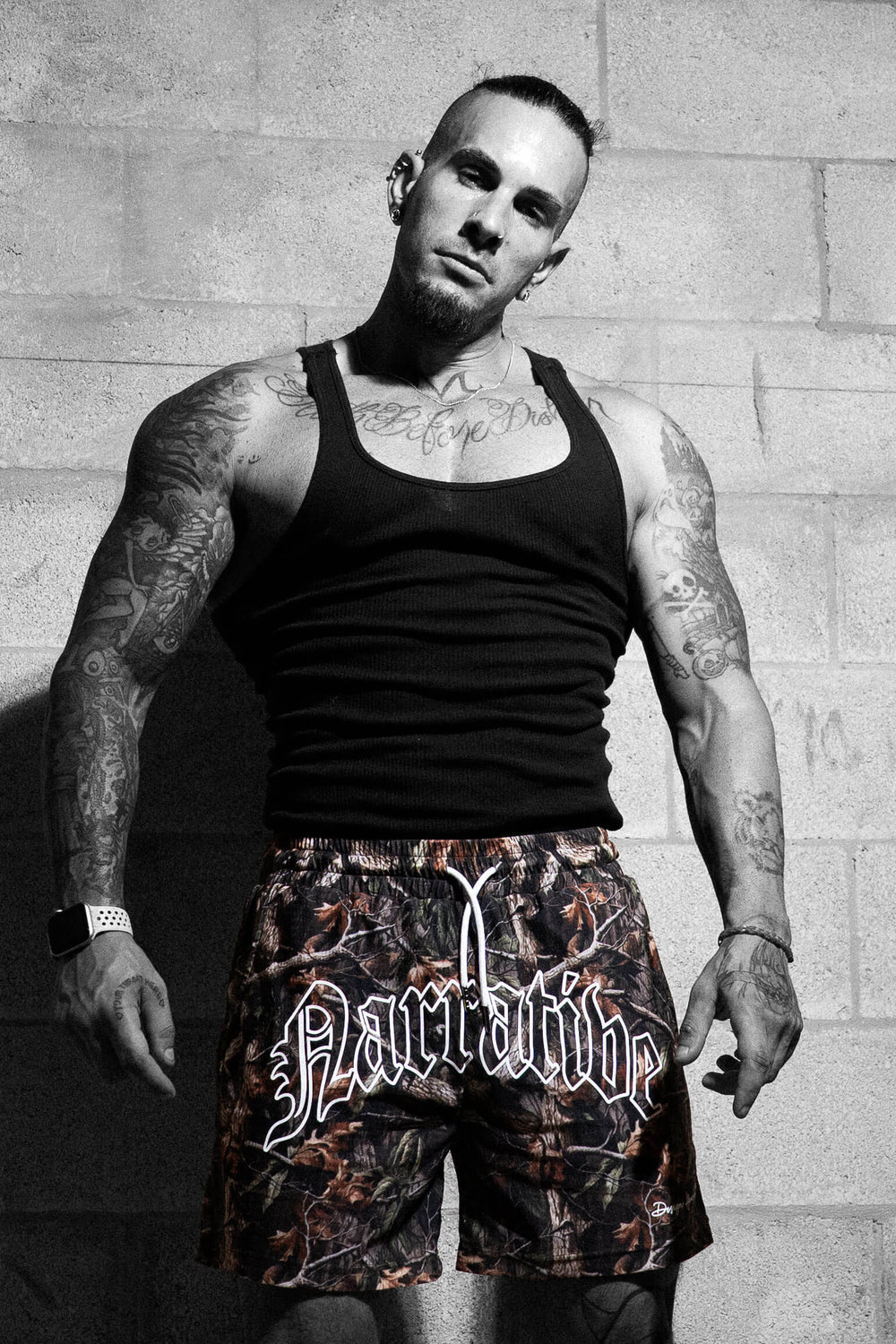 Signature Logo 5 inch inseam Shorts RealTree Camo, Model Pose 